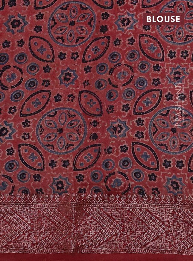 Chiniya silk saree black and maroon with plain body and woven border