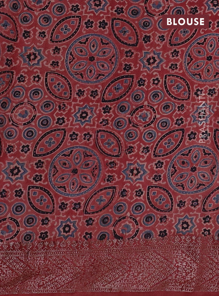 Chiniya silk saree green and maroon with plain body and woven border