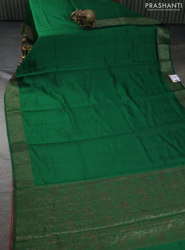 Chiniya silk saree green and maroon with plain body and woven border