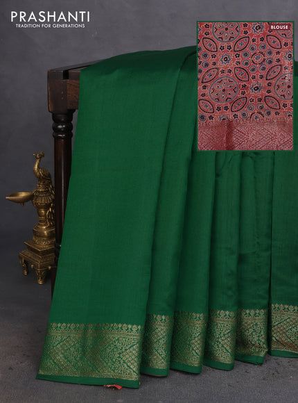 Chiniya silk saree green and maroon with plain body and woven border