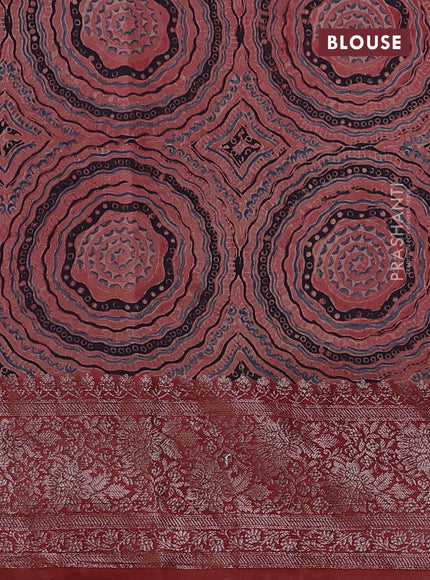 Chiniya silk saree black and maroon with plain body and woven border