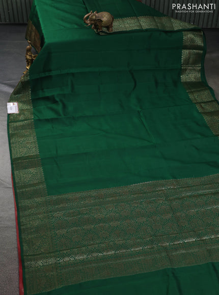 Chiniya silk saree green and rust shade with plain body and woven border