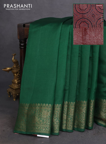 Chiniya silk saree green and rust shade with plain body and woven border
