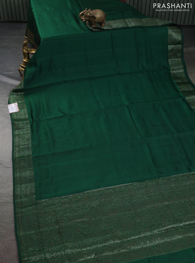 Chiniya silk saree green and maroon with plain body and woven border