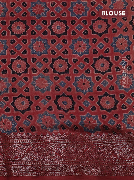 Chiniya silk saree green and maroon with plain body and woven border