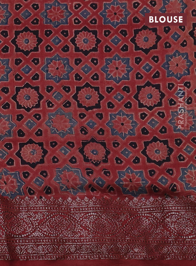 Chiniya silk saree green and maroon with plain body and woven border