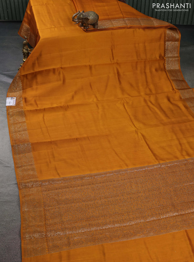 Chiniya silk saree dark mustard and maroon with plain body and woven border