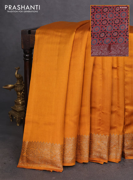 Chiniya silk saree dark mustard and maroon with plain body and woven border