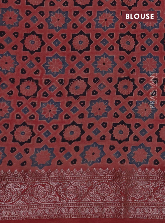 Chiniya silk saree black and maroon with plain body and woven border