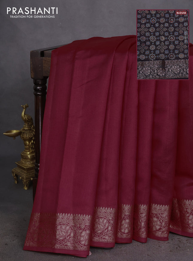 Chiniya silk saree maroon and black with plain body and woven border