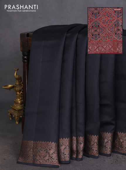 Chiniya silk saree black and maroon with plain body and woven border
