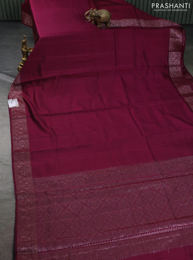 Chiniya silk saree wine shade and black with plain body and woven border