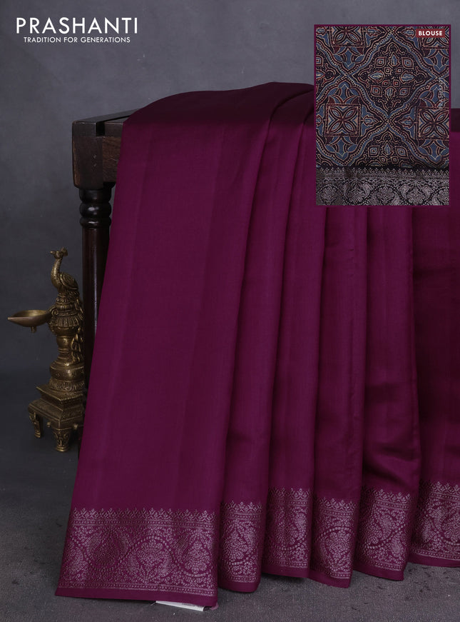 Chiniya silk saree wine shade and black with plain body and woven border
