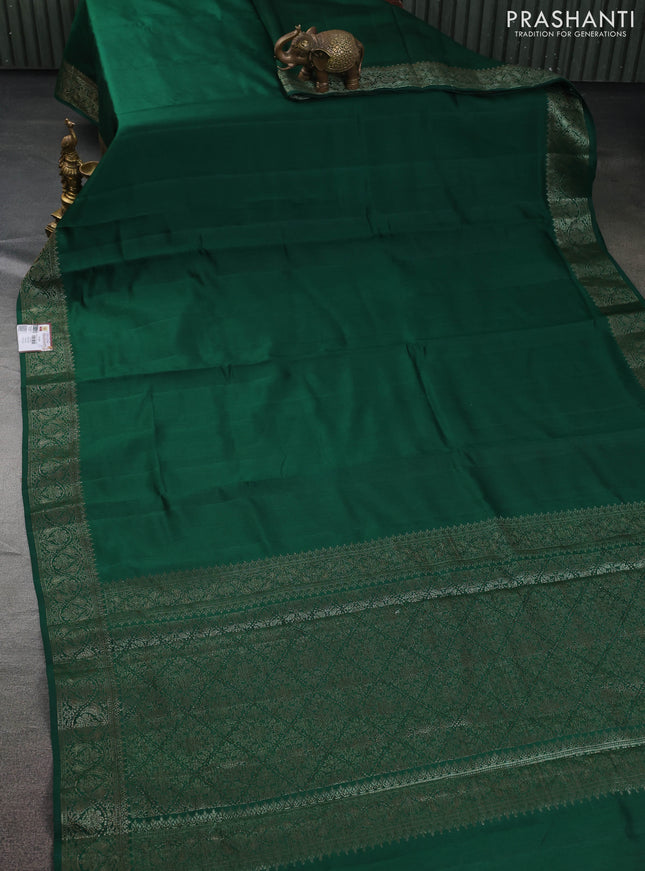 Chiniya silk saree green and rust shade with plain body and woven border