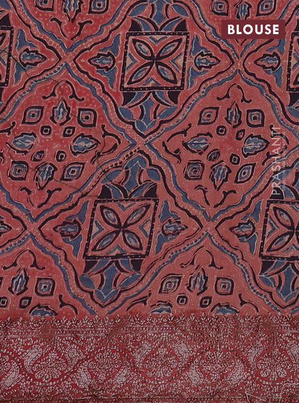 Chiniya silk saree green and rust shade with plain body and woven border