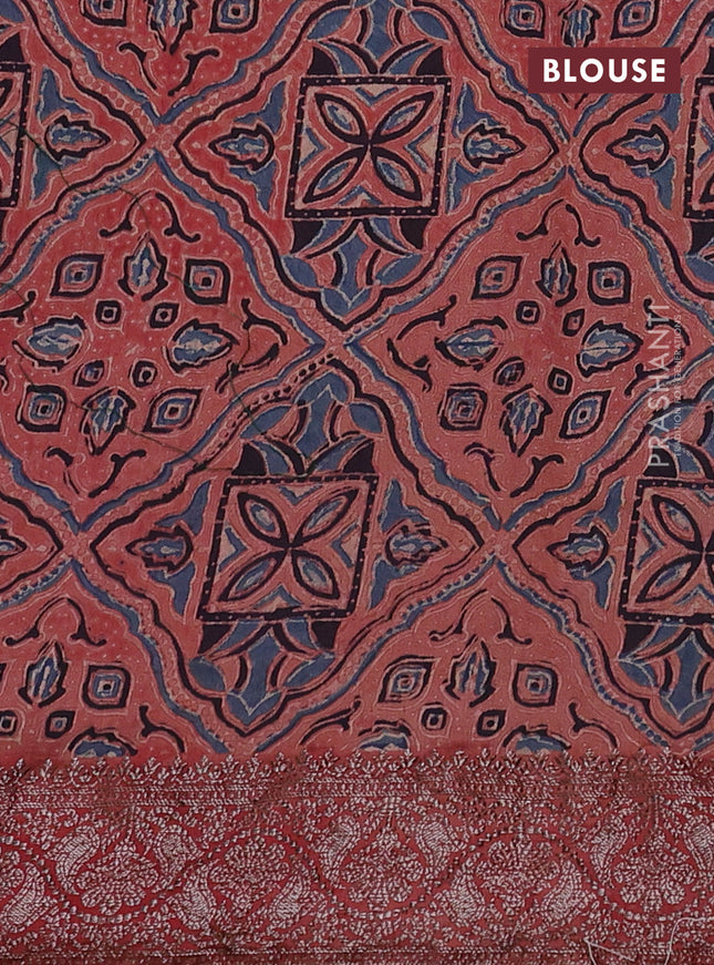 Chiniya silk saree green and rust shade with plain body and woven border