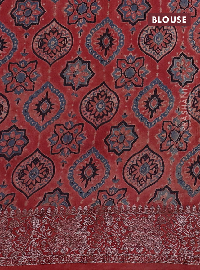 Chiniya silk saree black and rust shade with plain body and woven border