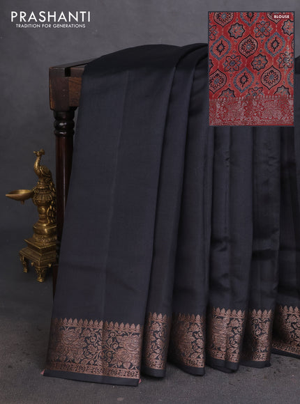 Chiniya silk saree black and rust shade with plain body and woven border