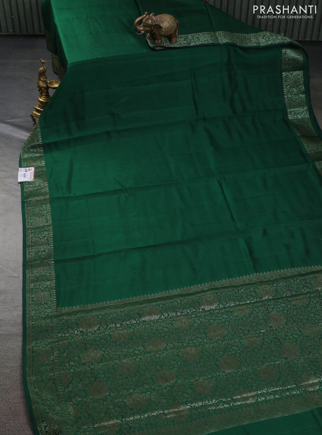 Chiniya silk saree green and maroon with plain body and woven border
