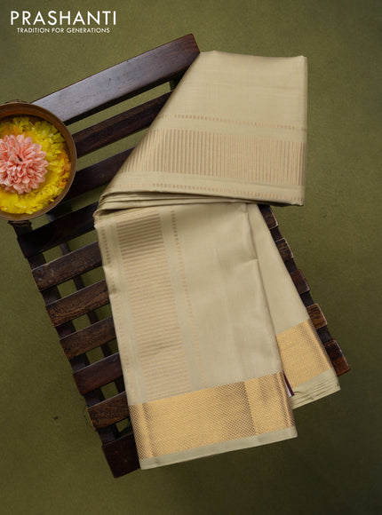9x5 Pure silk dhoti and matching shirt bit cream with zari woven border