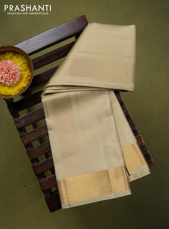 9x5 Pure silk dhoti and matching shirt bit cream with zari woven border