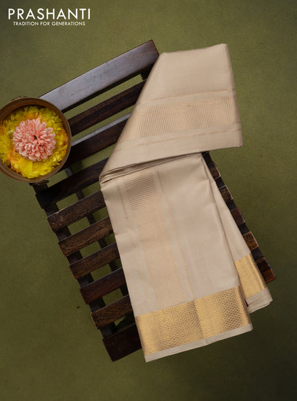 9x5 Pure silk dhoti and matching shirt bit cream with zari woven border
