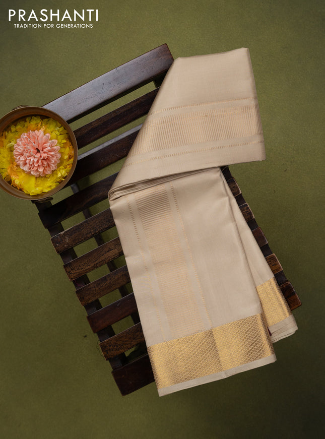 9x5 Pure silk dhoti and matching shirt bit cream with zari woven border