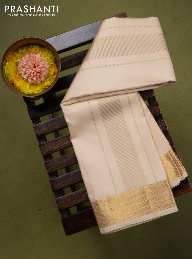 9x5 Pure silk dhoti and matching shirt bit cream with zari woven border
