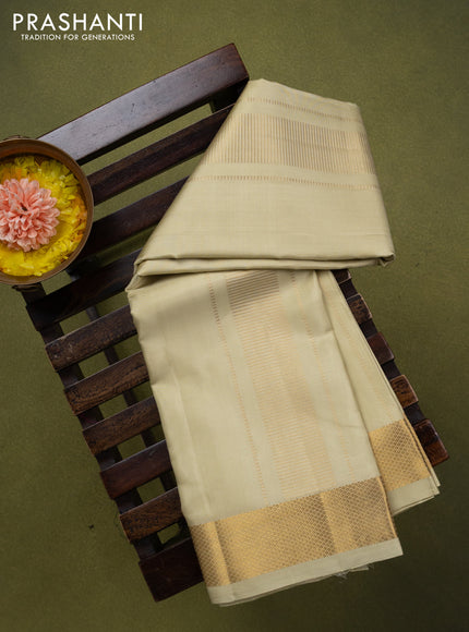 9x5 Pure silk dhoti and matching shirt bit cream with zari woven border