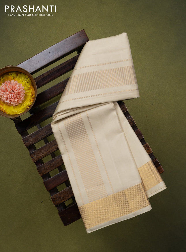 9x5 Pure silk dhoti and matching shirt bit cream with zari woven border