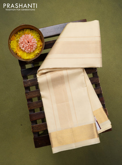 9x5 Pure silk dhoti and matching shirt bit cream with zari woven border