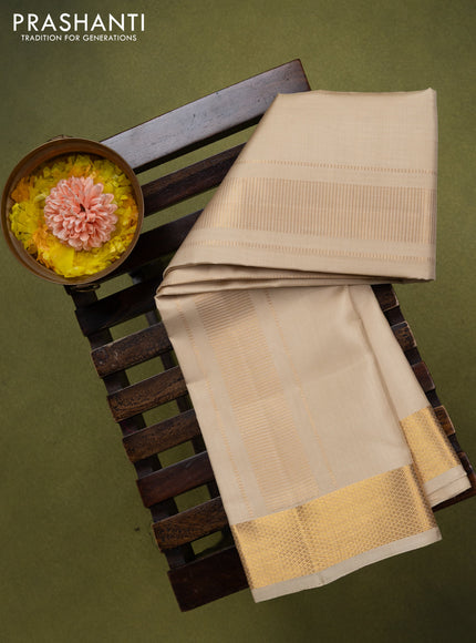9x5 Pure silk dhoti and matching shirt bit cream with zari woven border