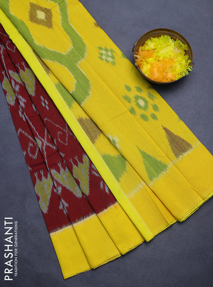 Ikat cotton saree maroon and yellow with allover ikat weaves and simple border