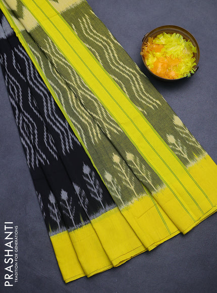 Ikat cotton saree black and yellow with allover zaig zag ikat weaves and simple border