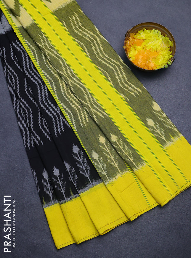 Ikat cotton saree black and yellow with allover zaig zag ikat weaves and simple border