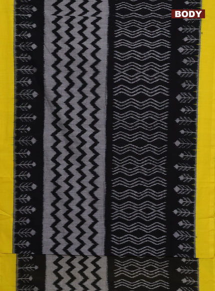 Ikat cotton saree black and yellow with allover zaig zag ikat weaves and simple border