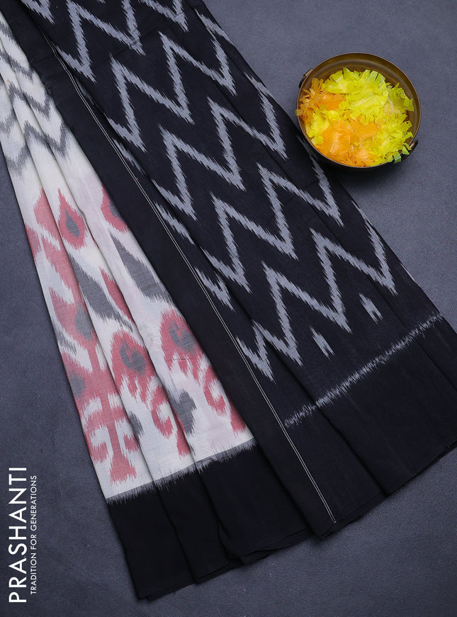 Ikat cotton saree off white and black with allover zaig zag ikat weaves and simple border