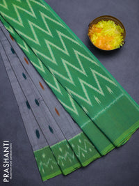 Ikat cotton saree grey and green with allover ikat weaves and simple border