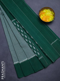 Ikat cotton saree green shade and green with palin body and long ikat woven border