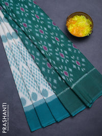 Ikat cotton saree cream and teal green with allover ikat butta weaves and simple border