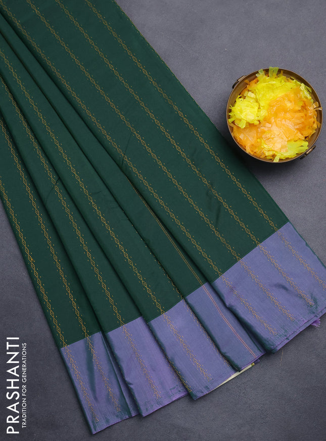 Arani semi silk saree green and dual shade of lavender with allover zari weaves and zari woven border