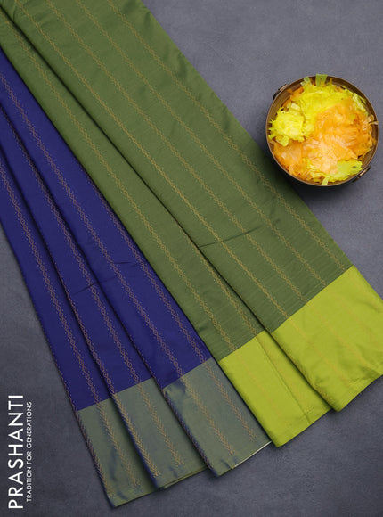 Arani semi silk saree dark blue and light green with allover zari weaves and zari woven border