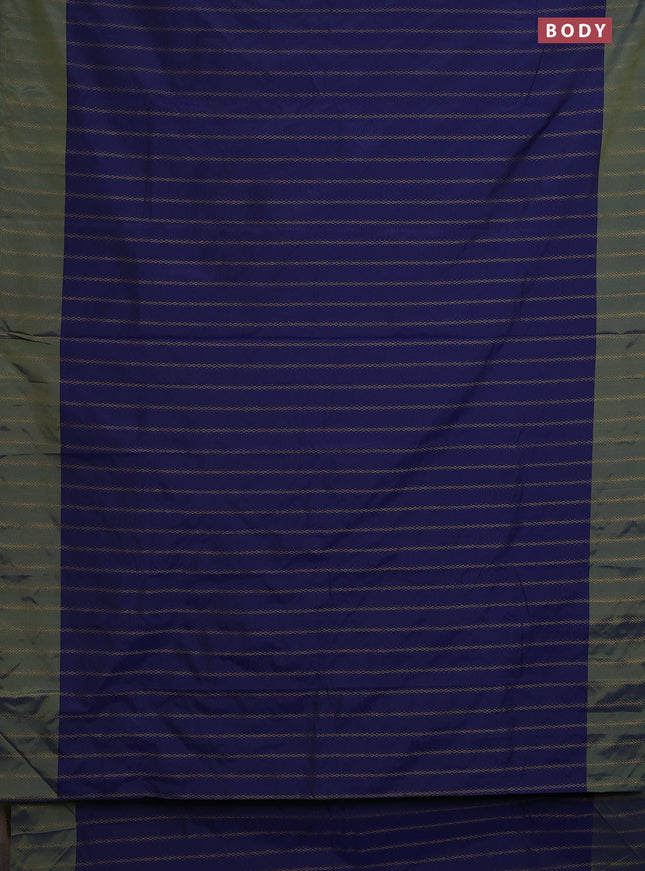 Arani semi silk saree dark blue and light green with allover zari weaves and zari woven border