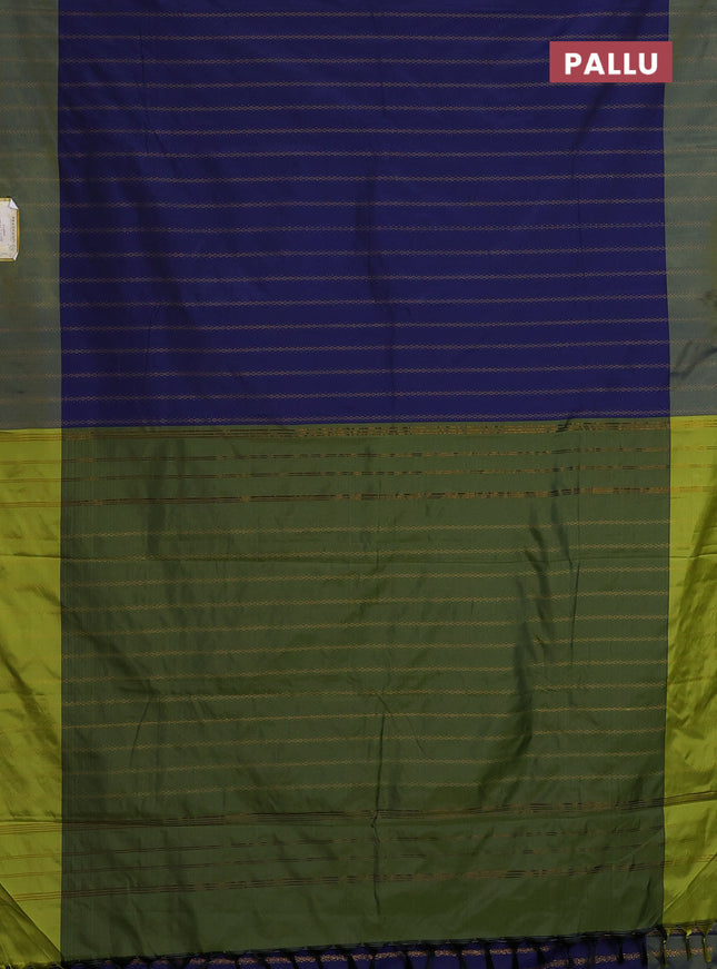 Arani semi silk saree dark blue and light green with allover zari weaves and zari woven border
