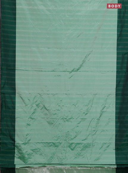 Arani semi silk saree pastel green and green with allover silver & gold zari weaves and woven border
