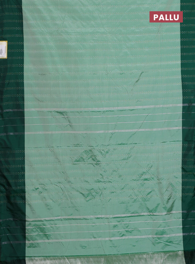Arani semi silk saree pastel green and green with allover silver & gold zari weaves and woven border