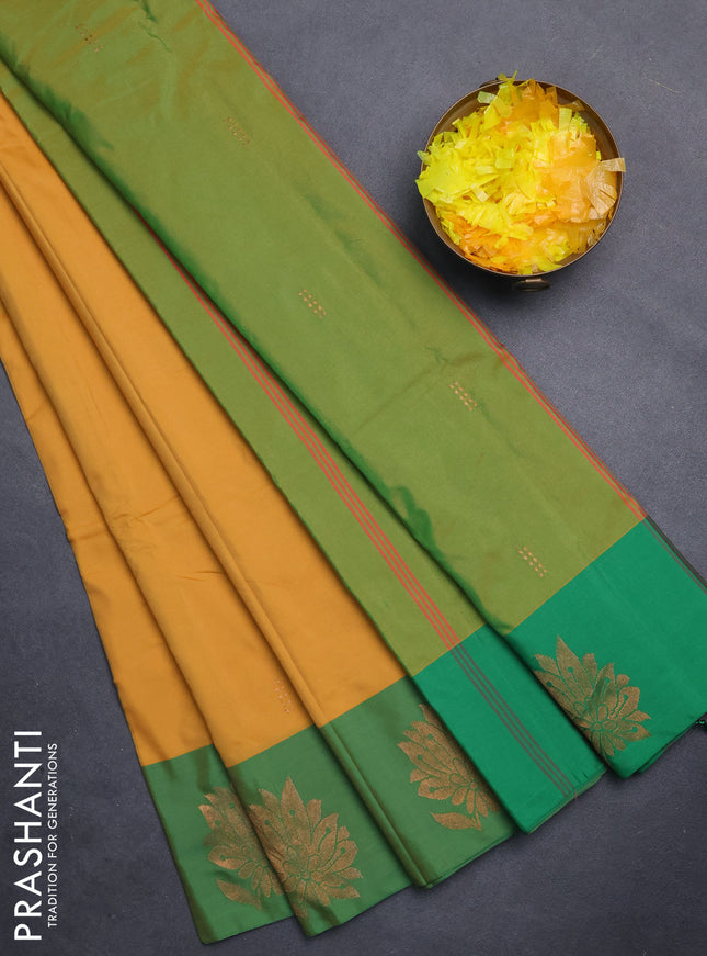 Arani semi silk saree mustard yellow and green with copper zari woven buttas and copper zari woven butta border