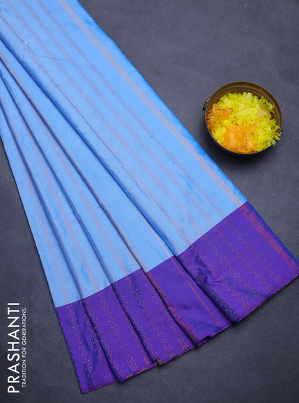 Arani semi silk saree blue and dual shade of violet with allover copper zari weaves and zari woven border