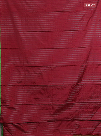 Arani semi silk saree maroon and light green with allover silver zari weaves and piping border