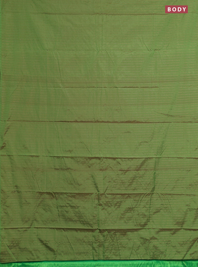 Arani semi silk saree green with allover copper zari weaves in borderless style